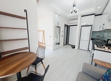 Стильная двухкомнатная квартира, 50м², в новом доме городского типа в центре Алании, 700м от моря ID-18494 фото-2