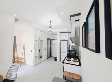 Стильная двухкомнатная квартира, 50м², в новом доме городского типа в центре Алании, 700м от моря ID-18494 фото-3