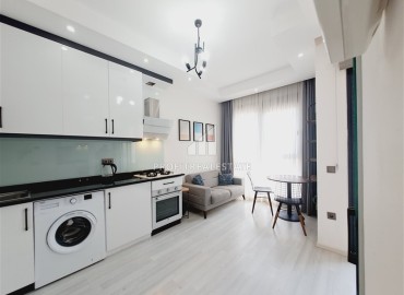 Стильная двухкомнатная квартира, 50м², в новом доме городского типа в центре Алании, 700м от моря ID-18494 фото-4