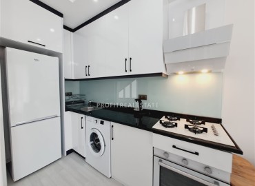 Стильная двухкомнатная квартира, 50м², в новом доме городского типа в центре Алании, 700м от моря ID-18494 фото-5