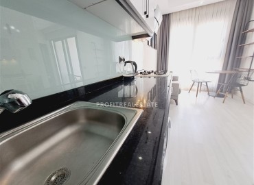 Стильная двухкомнатная квартира, 50м², в новом доме городского типа в центре Алании, 700м от моря ID-18494 фото-6