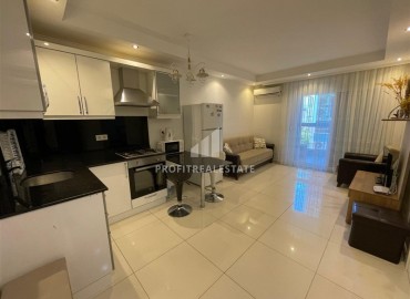 Уютная меблированная двухкомнатная квартира, 55м², в резиденции с бассейном в центре Алании, в 200м от пляжа Клеопатры ID-18500 фото-3