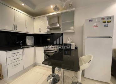 Уютная меблированная двухкомнатная квартира, 55м², в резиденции с бассейном в центре Алании, в 200м от пляжа Клеопатры ID-18500 фото-4