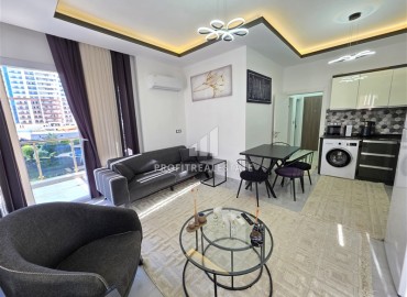 Готовая к проживанию, квартира 1+1, 60м², в современном комплексе с бассейном в Махмутларе, Алания ID-18506 фото-2