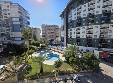 Готовая к проживанию, квартира 1+1, 60м², в современном комплексе с бассейном в Махмутларе, Алания ID-18506 фото-11