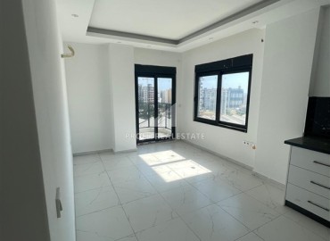 Новые апартаменты с одной спальней, 50м², в комплексе с бассейном в районе Махмутлар, Алания, по привлекательной цене ID-18507 фото-3