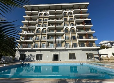 Стильная двухкомнатная квартира, 45м², в комплексе с инфраструктурой в Авсалларе, Алания, по отличной цене ID-18508 фото-1