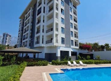 Двухкомнатная квартира, 45м², с дизайнерским интерьером в новом комфортабельном комплексе в Махмутларе, Алания ID-18509 фото-1