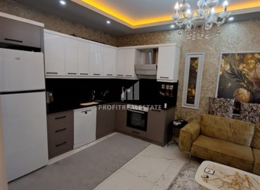 Двухкомнатная квартира, 45м², с дизайнерским интерьером в новом комфортабельном комплексе в Махмутларе, Алания ID-18509 фото-5