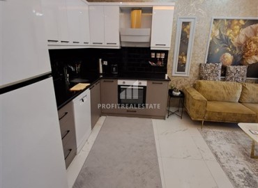 Двухкомнатная квартира, 45м², с дизайнерским интерьером в новом комфортабельном комплексе в Махмутларе, Алания ID-18509 фото-6