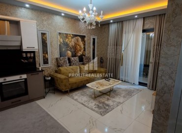 Двухкомнатная квартира, 45м², с дизайнерским интерьером в новом комфортабельном комплексе в Махмутларе, Алания ID-18509 фото-7