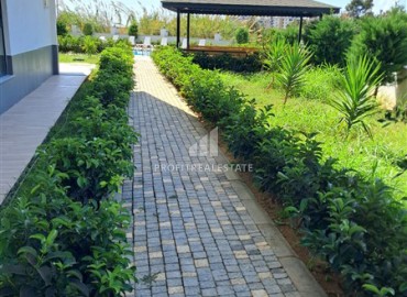 Двухкомнатная квартира, 45м², с дизайнерским интерьером в новом комфортабельном комплексе в Махмутларе, Алания ID-18509 фото-17