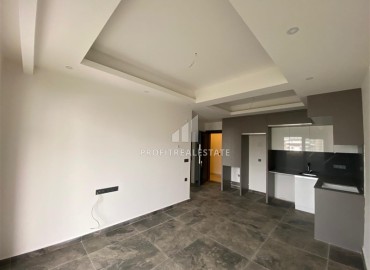 Апартаменты 1+1, 55м², с чистовой отделкой в резиденции премиум класса в Махмутларе, Алания ID-18510 фото-2