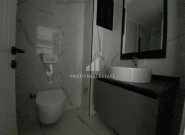 Апартаменты 1+1, 55м², с чистовой отделкой в резиденции премиум класса в Махмутларе, Алания ID-18510 фото-7