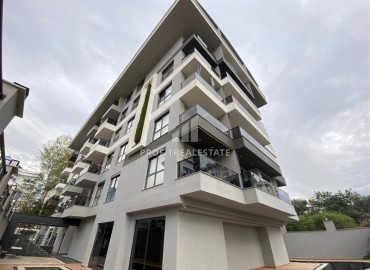 Апартаменты 1+1, 55м², с чистовой отделкой в резиденции премиум класса в Махмутларе, Алания ID-18510 фото-11