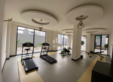 Апартаменты 1+1, 55м², с чистовой отделкой в резиденции премиум класса в Махмутларе, Алания ID-18510 фото-12