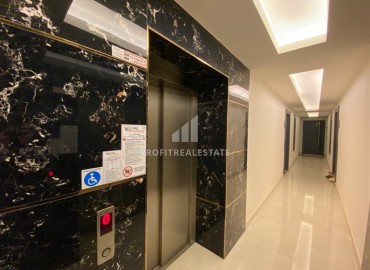 Апартаменты 1+1, 55м², с чистовой отделкой в резиденции премиум класса в Махмутларе, Алания ID-18510 фото-14