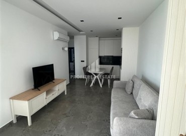 Меблированные апартаменты 1+1, 66,5м², с видом на море в элегантной резиденции на первой береговой линии в Каргыджаке, Алания ID-18511 фото-2