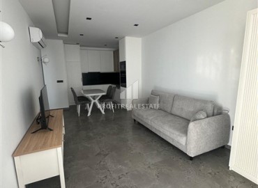 Меблированные апартаменты 1+1, 66,5м², с видом на море в элегантной резиденции на первой береговой линии в Каргыджаке, Алания ID-18511 фото-4