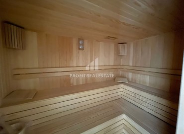 Меблированные апартаменты 1+1, 66,5м², с видом на море в элегантной резиденции на первой береговой линии в Каргыджаке, Алания ID-18511 фото-18