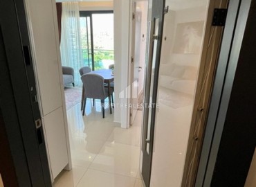 Двухкомнатная меблированная квартира, 50м², с видом на горы в комплексе с отельной инфраструктурой в Махмутларе, Алания ID-18512 фото-7