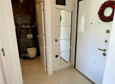 Двухкомнатная меблированная квартира, 50м², с видом на горы в комплексе с отельной инфраструктурой в Махмутларе, Алания ID-18512 фото-8