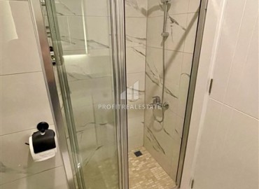 Двухкомнатная меблированная квартира, 50м², с видом на горы в комплексе с отельной инфраструктурой в Махмутларе, Алания ID-18512 фото-10