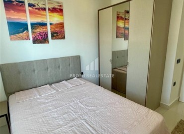 Двухкомнатная меблированная квартира, 50м², с видом на горы в комплексе с отельной инфраструктурой в Махмутларе, Алания ID-18512 фото-12
