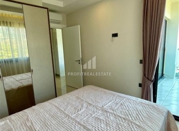 Двухкомнатная меблированная квартира, 50м², с видом на горы в комплексе с отельной инфраструктурой в Махмутларе, Алания ID-18512 фото-13
