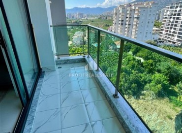 Двухкомнатная меблированная квартира, 50м², с видом на горы в комплексе с отельной инфраструктурой в Махмутларе, Алания ID-18512 фото-14