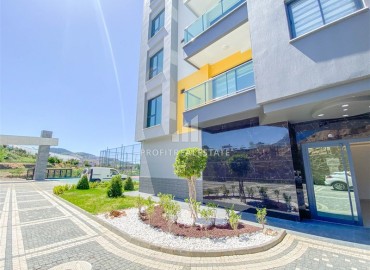 Двухкомнатная меблированная квартира, 50м², с видом на горы в комплексе с отельной инфраструктурой в Махмутларе, Алания ID-18512 фото-19