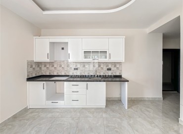 Новая квартира с одной спальней, 68м², в новом комплексе с инфраструктурой, в 400м от моря в Махмутларе, Алания ID-18514 фото-3