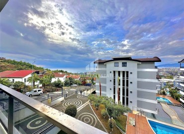 Элегантная видовая двухкомнатная квартира, 64м², в элитном комплексе района Каргыджак, Алания ID-18515 фото-11