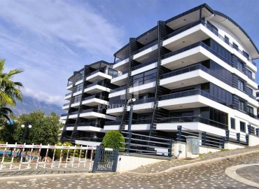 Элегантная видовая двухкомнатная квартира, 64м², в элитном комплексе района Каргыджак, Алания ID-18515 фото-13