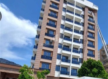 Квартира с одной спальней, 55м², с видом на горы в комплексе с инфраструктурой в Коньяалты, микрорайон Сарысу, Анталия ID-18519 фото-1