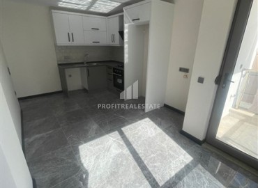 Квартира с одной спальней, 55м², с видом на горы в комплексе с инфраструктурой в Коньяалты, микрорайон Сарысу, Анталия ID-18519 фото-2