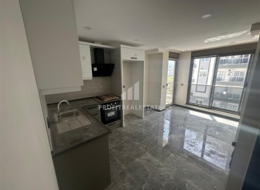 Квартира с одной спальней, 55м², с видом на горы в комплексе с инфраструктурой в Коньяалты, микрорайон Сарысу, Анталия ID-18519 фото-3