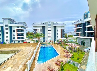 Уютная двухкомнатная квартира, 52м², в новой резиденции с зимним бассейном в районе Оба, Алания ID-18520 фото-1