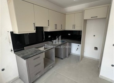 Апартаменты 1+1, 49м², в комплексе премиум класса на окончательном этапе строительства в центре Махмутлара, Алания ID-17346 фото-4