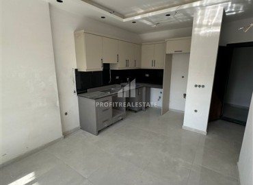 Апартаменты 1+1, 49м², в комплексе премиум класса на окончательном этапе строительства в центре Махмутлара, Алания ID-17346 фото-5