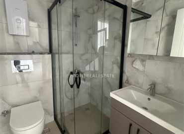 Апартаменты 1+1, 49м², в комплексе премиум класса на окончательном этапе строительства в центре Махмутлара, Алания ID-17346 фото-9