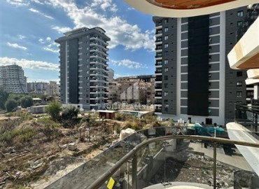 Апартаменты 1+1, 49м², в комплексе премиум класса на окончательном этапе строительства в центре Махмутлара, Алания ID-17346 фото-10