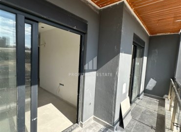 Апартаменты 1+1, 49м², в комплексе премиум класса на окончательном этапе строительства в центре Махмутлара, Алания ID-17346 фото-11