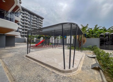 Апартаменты 1+1, 49м², в комплексе премиум класса на окончательном этапе строительства в центре Махмутлара, Алания ID-17346 фото-18