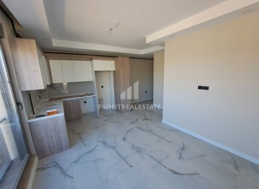 Двухкомнатная квартира, 48м², в новостройке 2025 года с бассейном и парковкой в Анталии, район Кепез ID-18525 фото-2