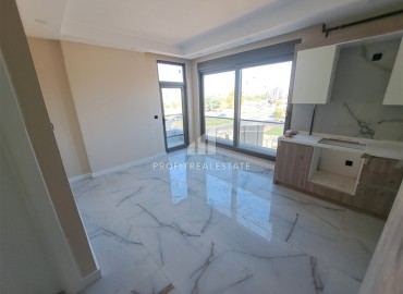 Двухкомнатная квартира, 48м², в новостройке 2025 года с бассейном и парковкой в Анталии, район Кепез ID-18525 фото-3