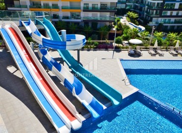 Видовая двухкомнатная квартира, 60м², в элитном комплексе Каргыджака, Алания, в 150м от собственного пляжа ID-18526 фото-17