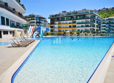 Видовая двухкомнатная квартира, 60м², в элитном комплексе Каргыджака, Алания, в 150м от собственного пляжа ID-18526 фото-18