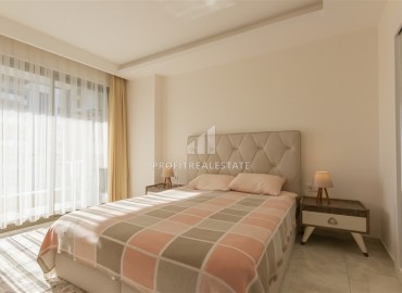 Элегантная квартира c оДной спальней, 80м² с видом на море в элитном комплексе в Махмутларе, Алания ID-18527 фото-9