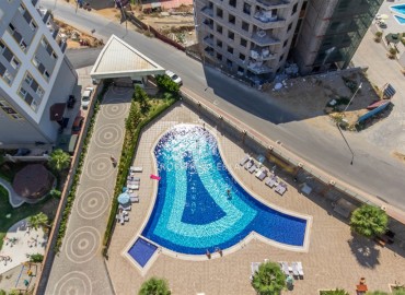 Элегантная квартира c оДной спальней, 80м² с видом на море в элитном комплексе в Махмутларе, Алания ID-18527 фото-18